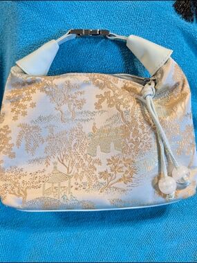 Elegant Light Blue Jacquard Shoulder Bag with Gold Motif